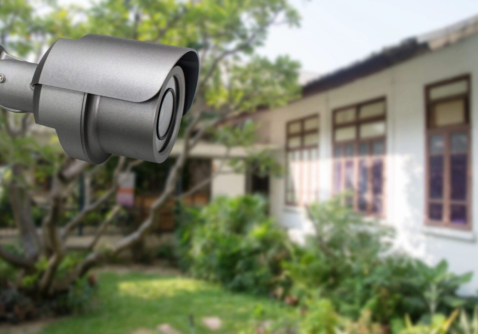 A camera is in front of a house.